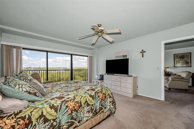 a bathroom with a granite countertop sink a mirror and shower