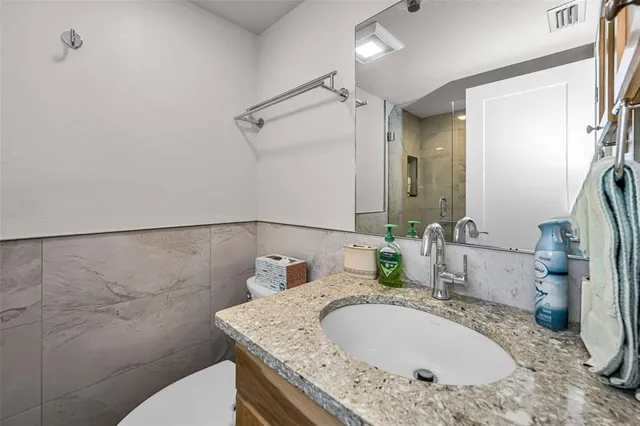 a view of a garden with an ocean