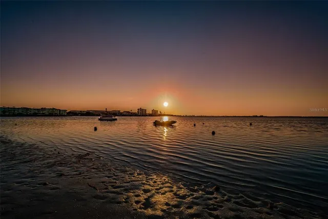 a view of a workspace with bookshelf