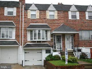 12109 Medford Road Philadelphia, PA 19154 - Photo 1 of 1 a front view of a house with a yard