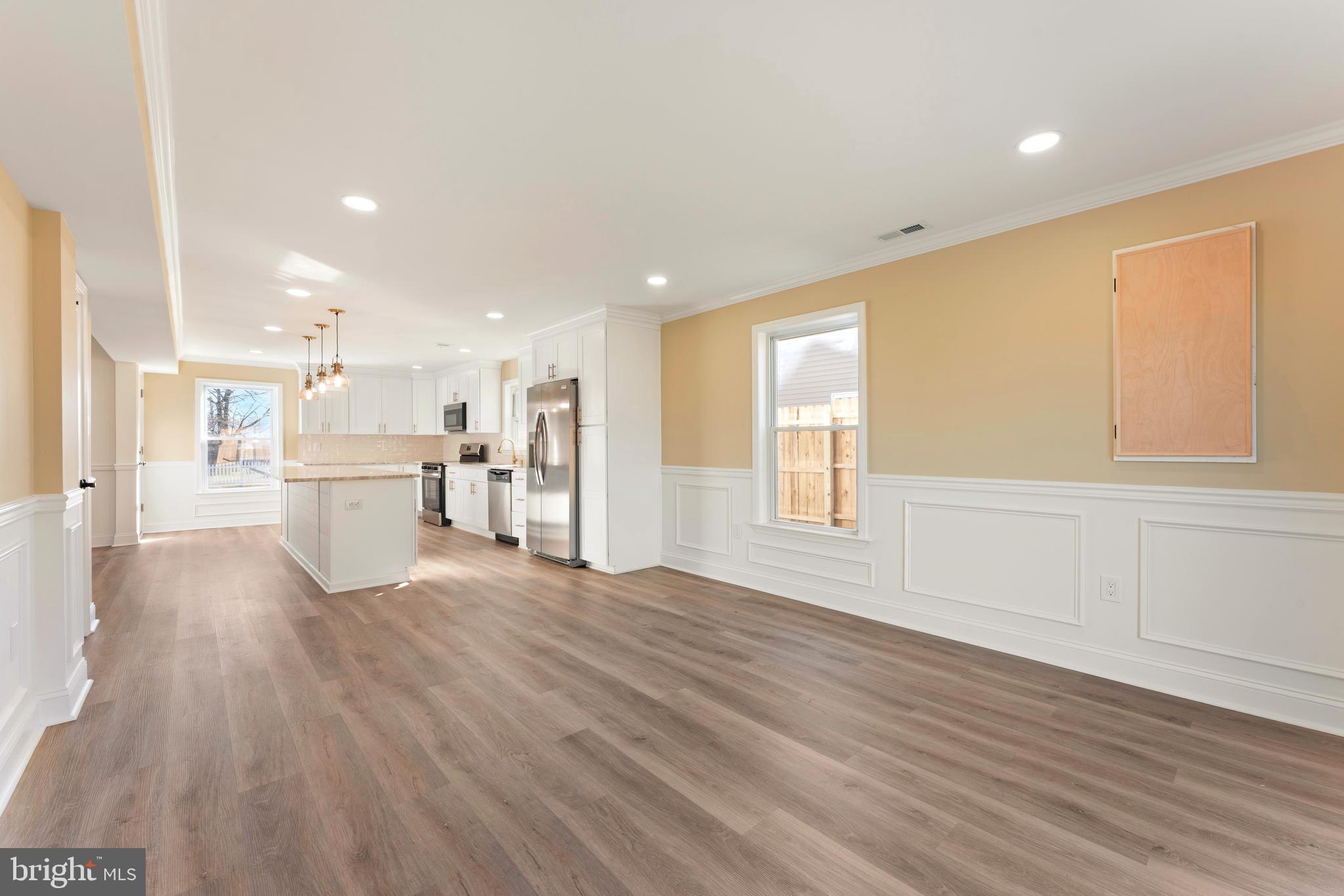 43 Petunia Road Levittown, PA 19056 - Photo 16 of 35 a view of a kitchen with furniture and wooden floor