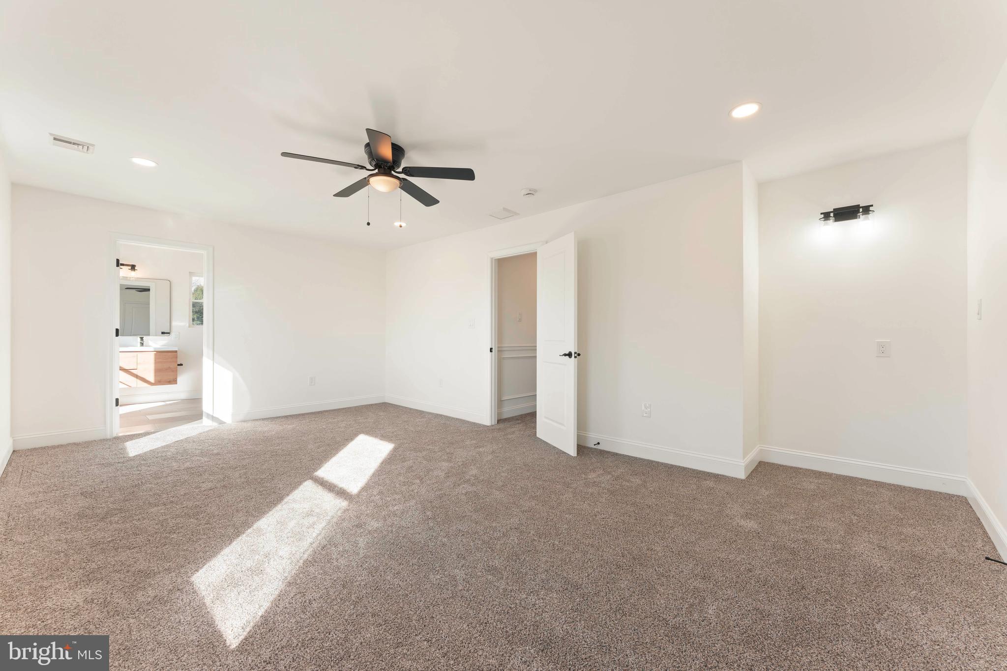 43 Petunia Road Levittown, PA 19056 - Photo 23 of 35 a view of a livingroom with a ceiling fan