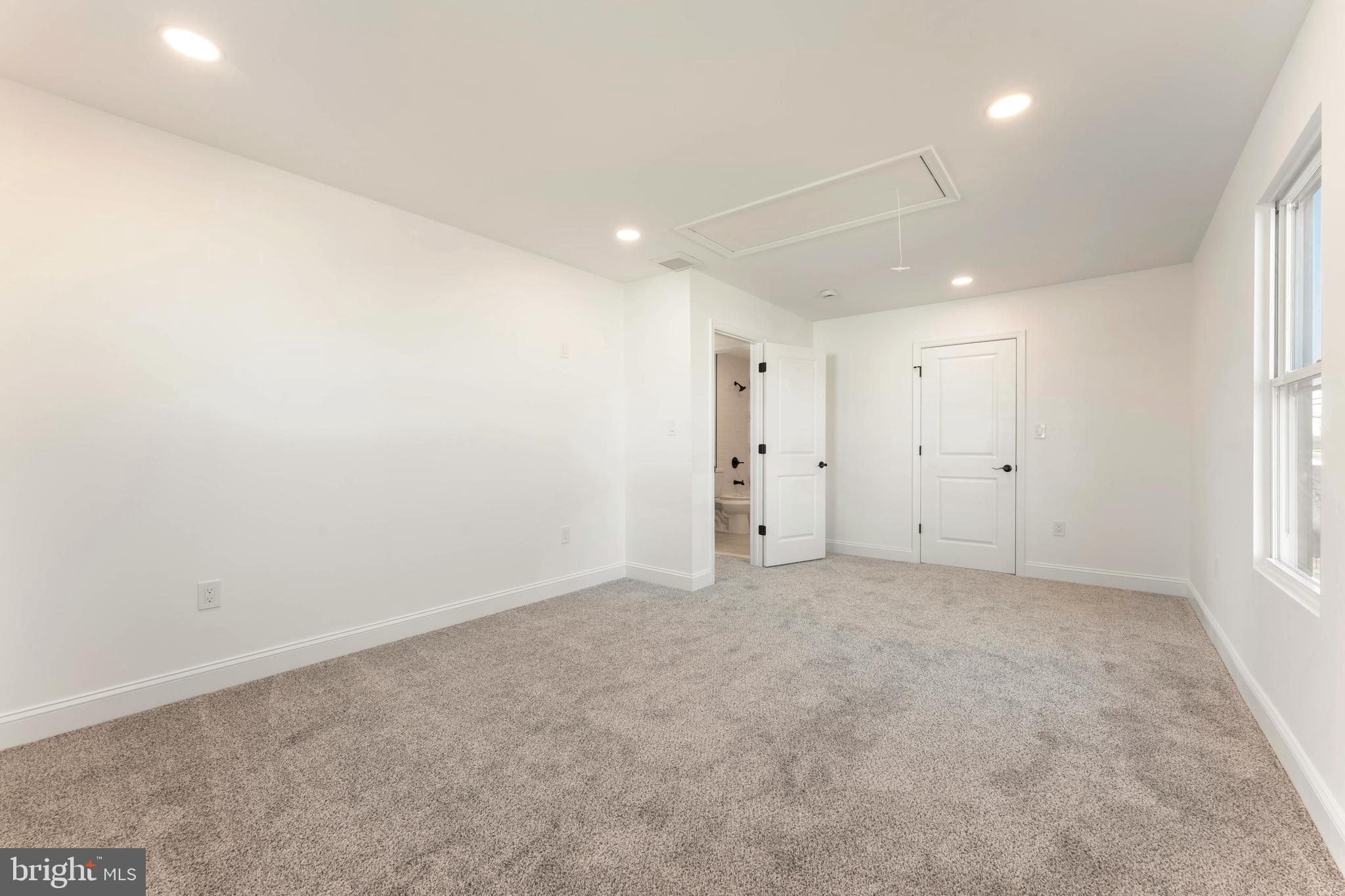 43 Petunia Road Levittown, PA 19056 - Photo 28 of 35 an empty room with windows and closet