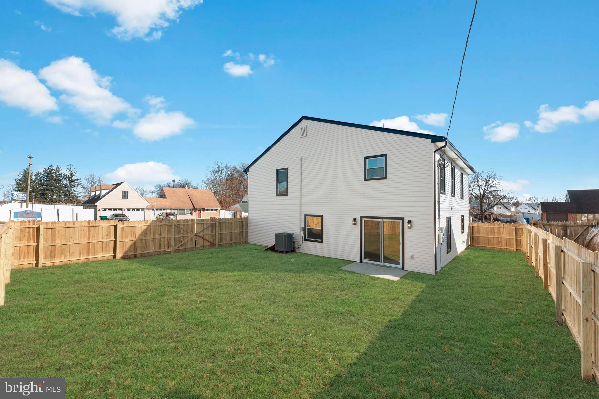 43 Petunia Road Levittown, PA 19056 - Photo 34 of 35 a view of a house with a yard and sitting area