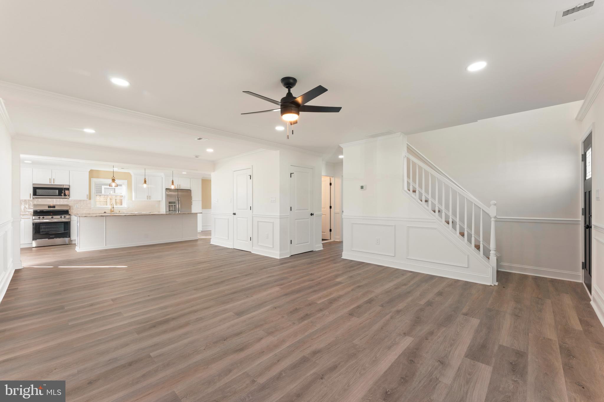43 Petunia Road Levittown, PA 19056 - Photo 4 of 35 a view of an empty room with wooden floor