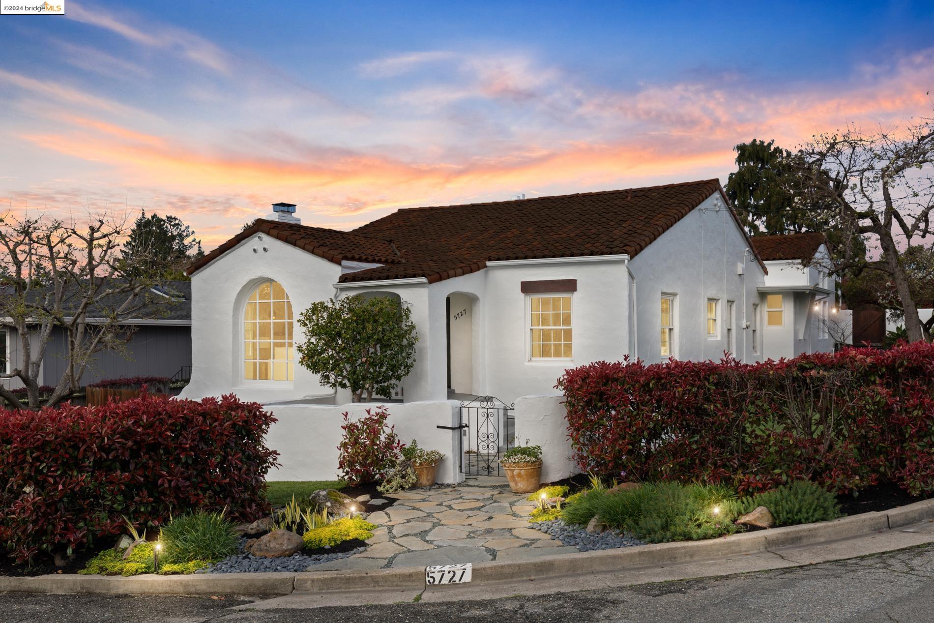 5727 Amy Drive Oakland, CA 94618 - Photo 1 of 1 a front view of a house with a yard
