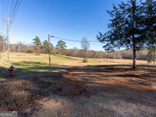 a view of a yard with an ocean