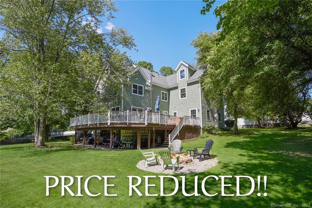 73 North Street Ridgefield, CT 06877 - Photo 1 of 1 a front view of a house with garden