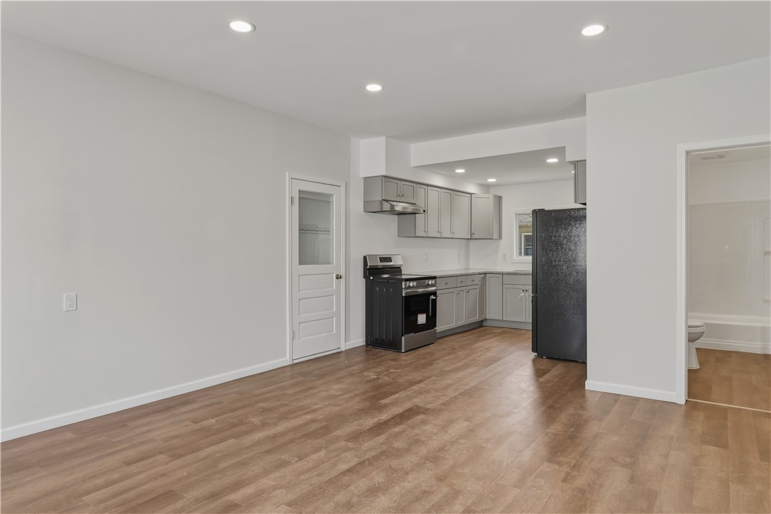 86 West 2nd Street Corning, NY 14830 - Photo 3 of 49 Downstairs kitchen with open eat in area