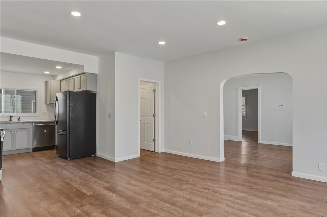 86 West 2nd Street Corning, NY 14830 - Photo 7 of 49 Downstairs kitchen and eat in into LR