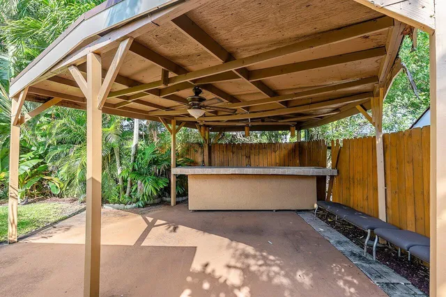 a view of backyard with cabin