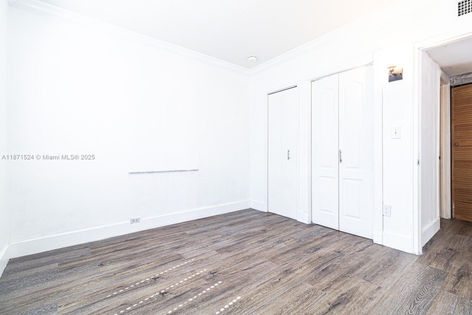 15600 Northwest 157th St Road Miami Gardens, FL 33054 - Photo 17 of 25 a view of a room with wooden floor
