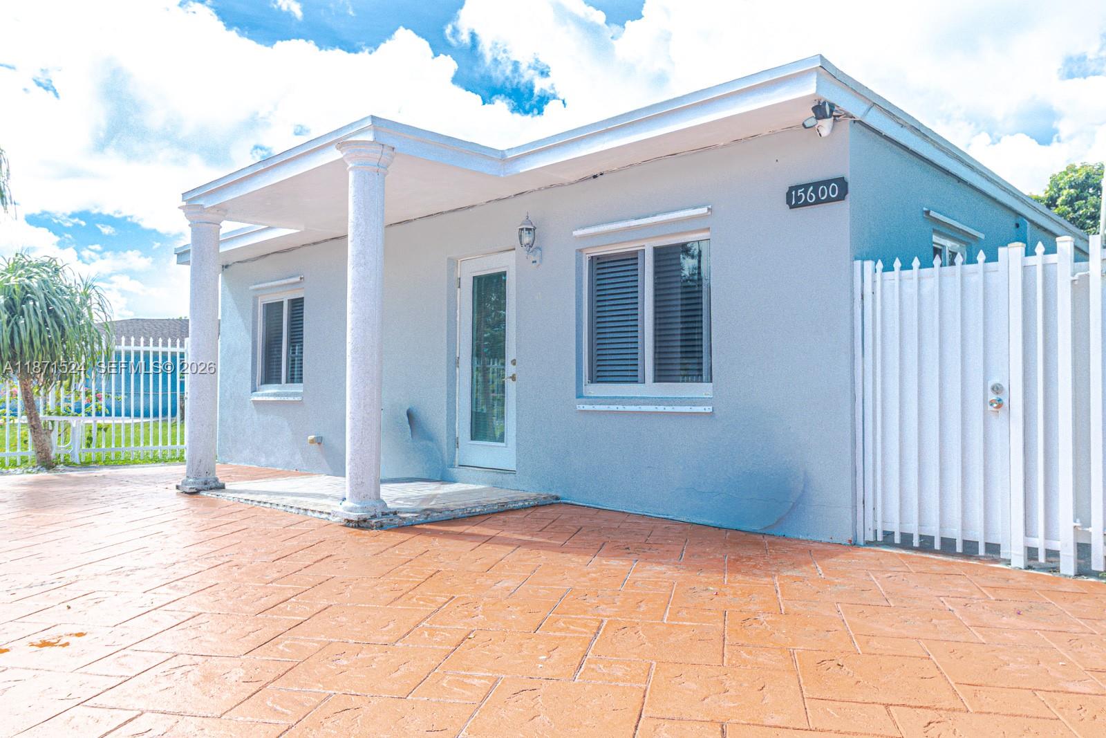 15600 Northwest 157th St Road Miami Gardens, FL 33054 - Photo 19 of 21 a view of backyard with a garden