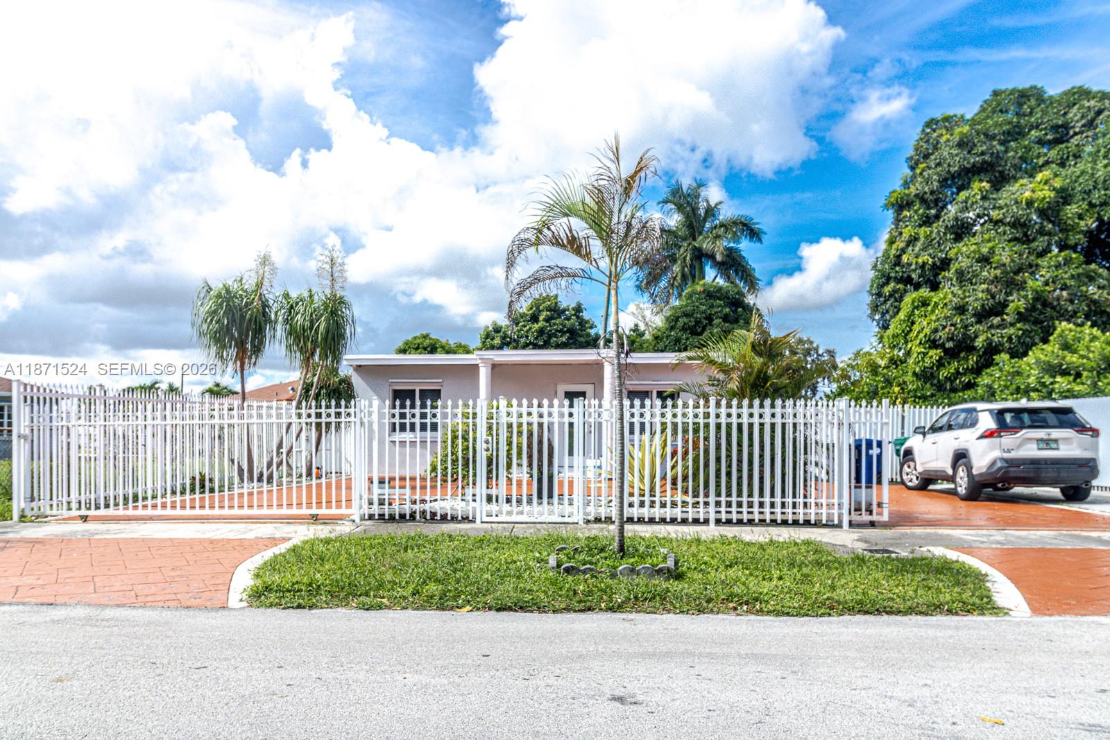 15600 Northwest 157th St Road Miami Gardens, FL 33054 - Photo 20 of 21 a view of a street from a balcony