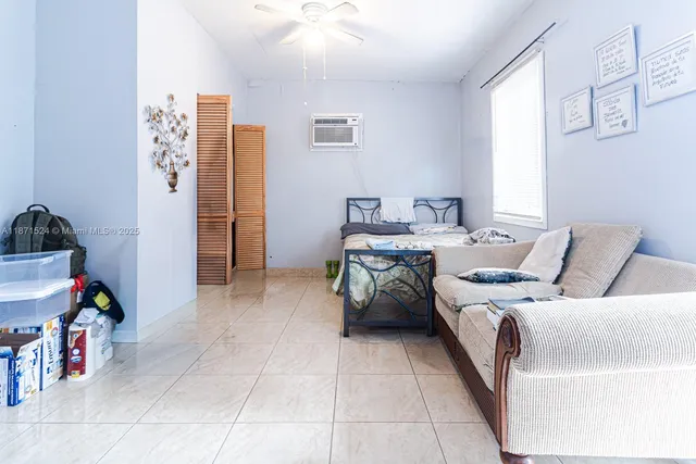 a bed room with a bed and a couch