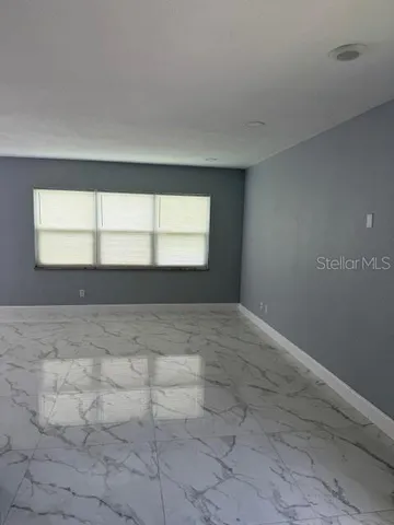 a view of empty room with window