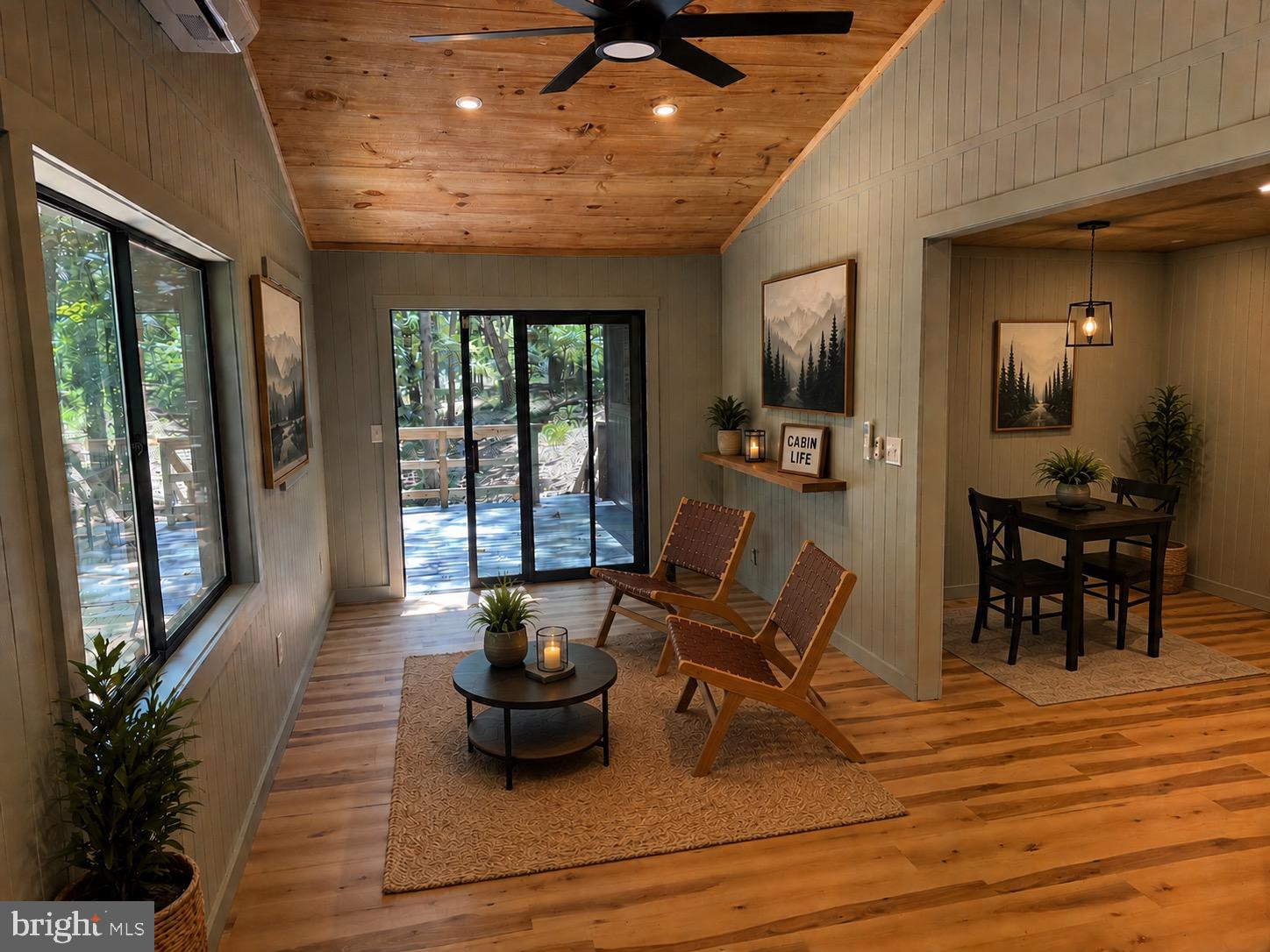 689 Snider's Ridge Mathias, WV 26812 - Photo 32 of 104 Great Room AI staged sitting area