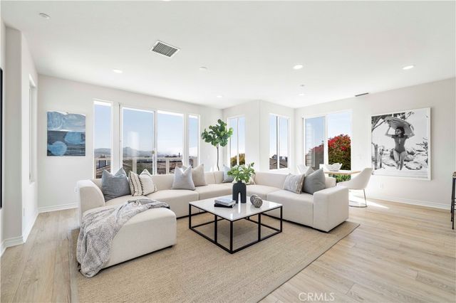 a view of a bathroom from a hallway