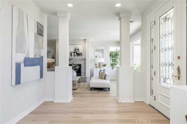 a spacious bedroom with a bed and a couch