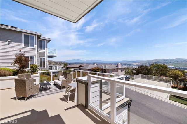 a view of a terrace with sitting area