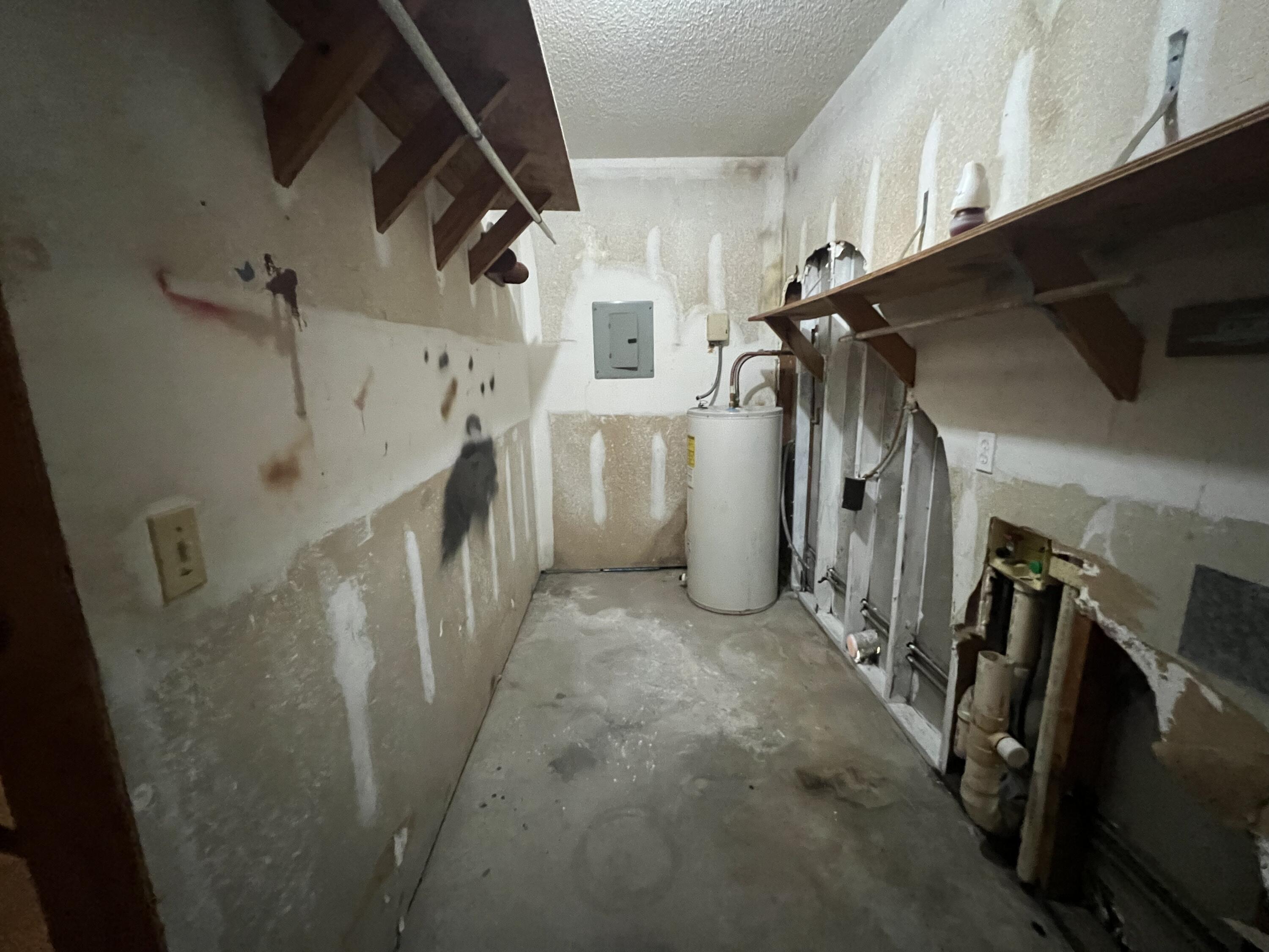 5256 Lassiter Road Milton, FL 32571 - Photo 17 of 20 a view of a garage with storage