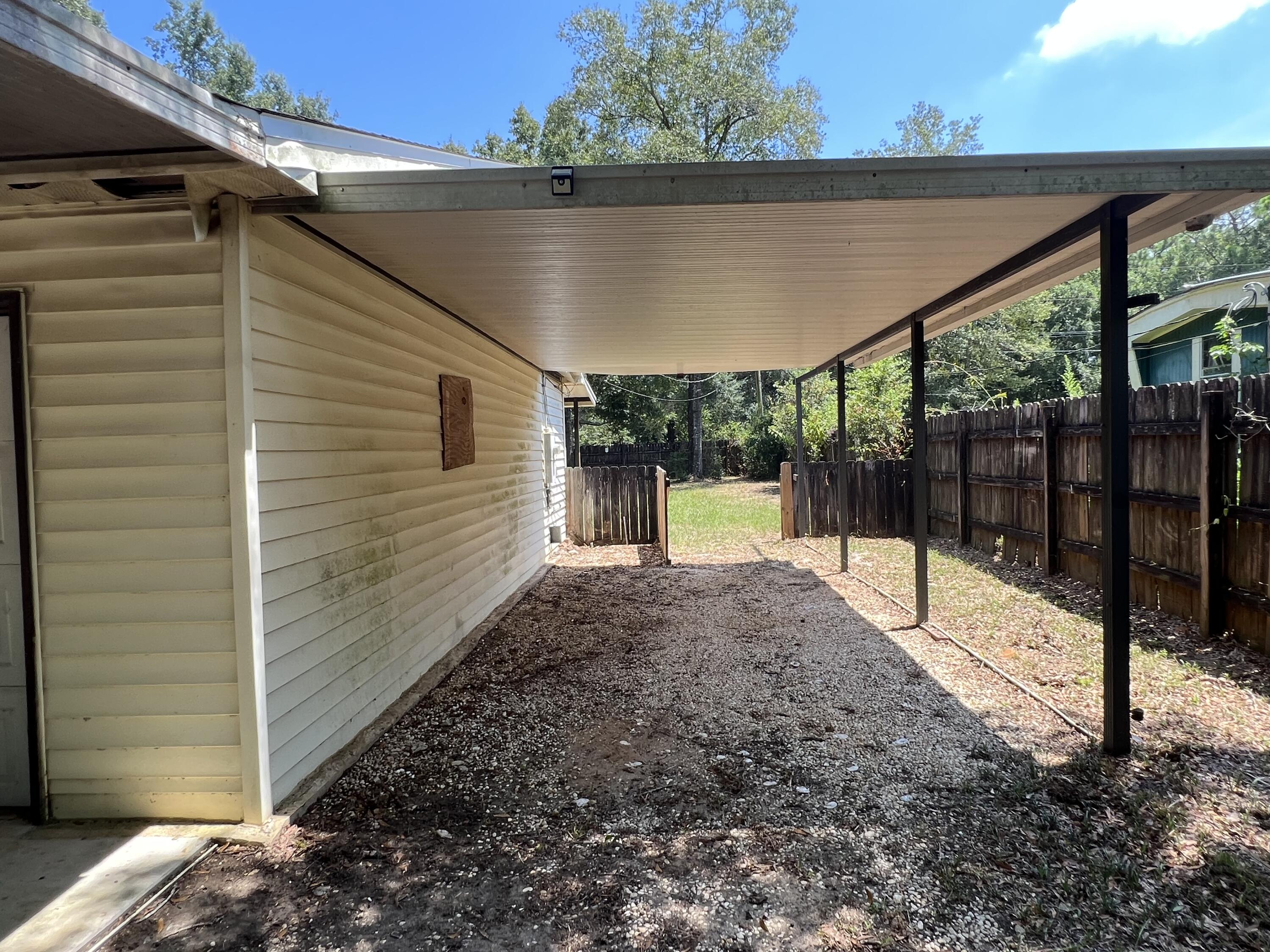 5256 Lassiter Road Milton, FL 32571 - Photo 19 of 20 a view of backyard of the house