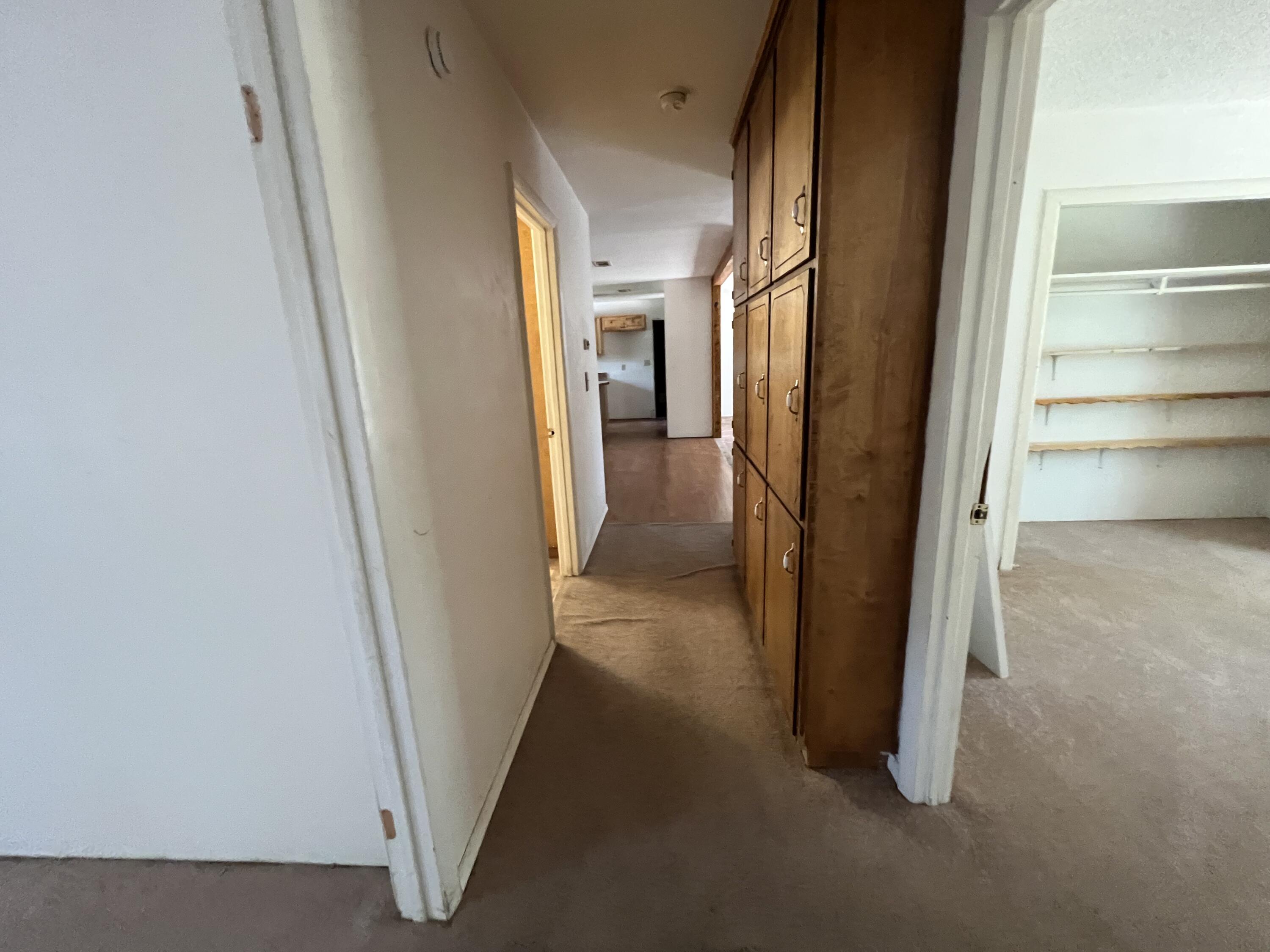 5256 Lassiter Road Milton, FL 32571 - Photo 6 of 20 a view of a hallway with wooden floor and entryway