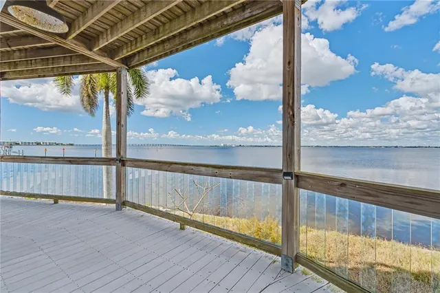 a view of a balcony with an ocean view