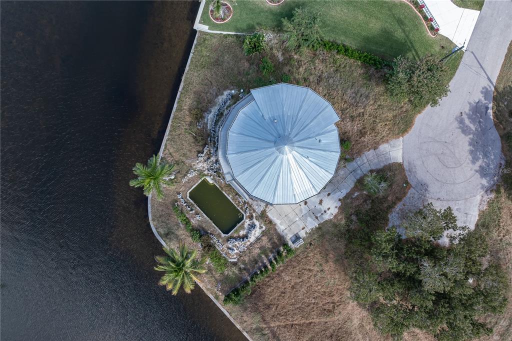 321 Bayridge Place Punta Gorda, FL 33950 - Photo 46 of 50 an aerial view of a house with a yard