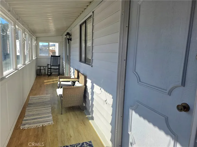 a spacious bathroom with double sink and a window