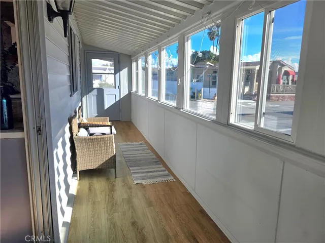 a kitchen with stainless steel appliances granite countertop a refrigerator sink and stove