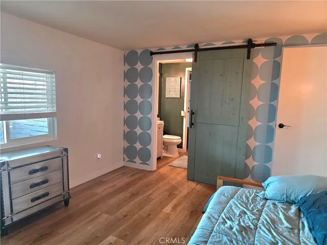 a view of a kitchen from the hallway