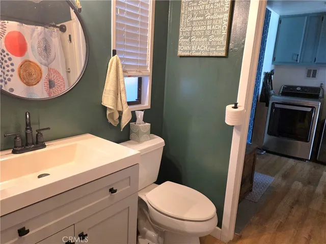 a kitchen with a stove and a refrigerator