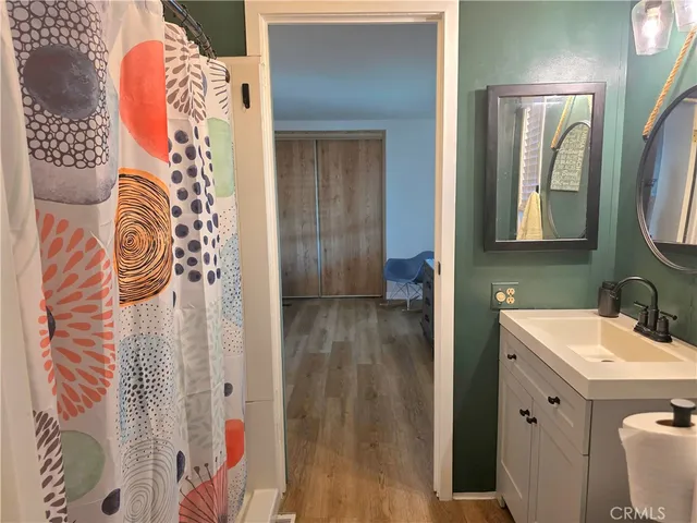 a view of entryway with wooden door