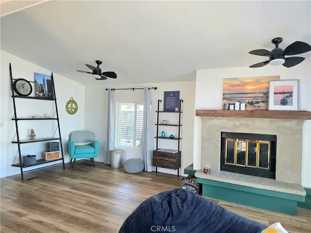 a bedroom with furniture and a fireplace