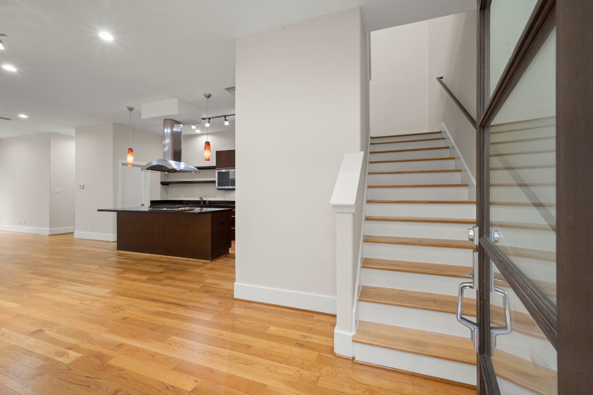 5527 Darling Street, Unit A Houston, TX 77007 - Photo 6 of 31 a view of kitchen with wooden floor and electronic appliances