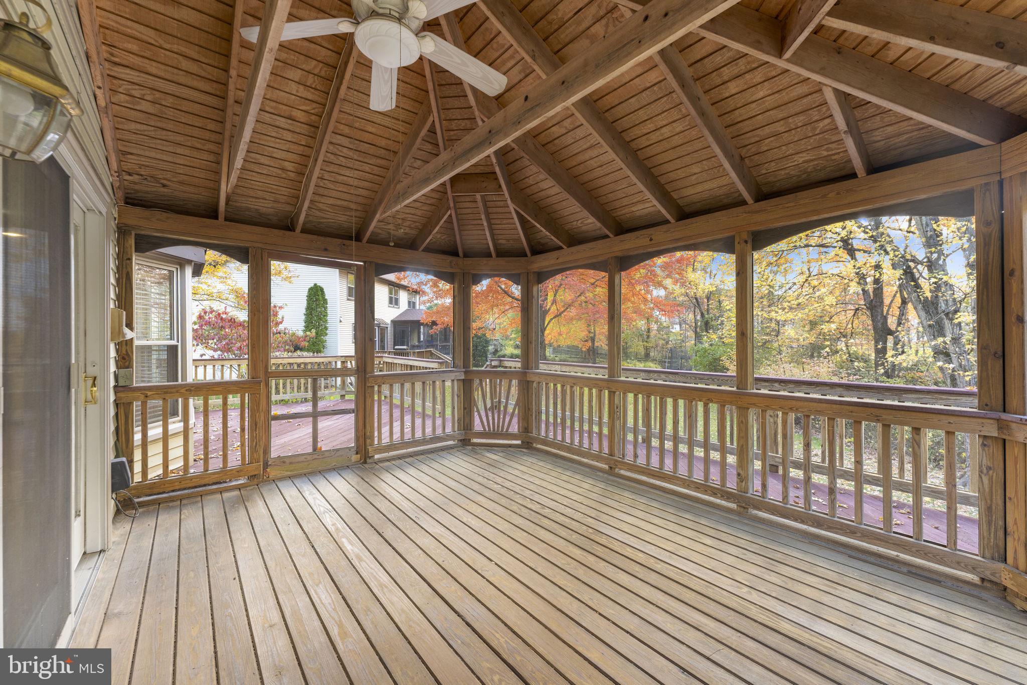 12574 Quincy Adams Court Herndon, VA 20171 - Photo 13 of 67 a view of porch with wooden floor in outdoor space