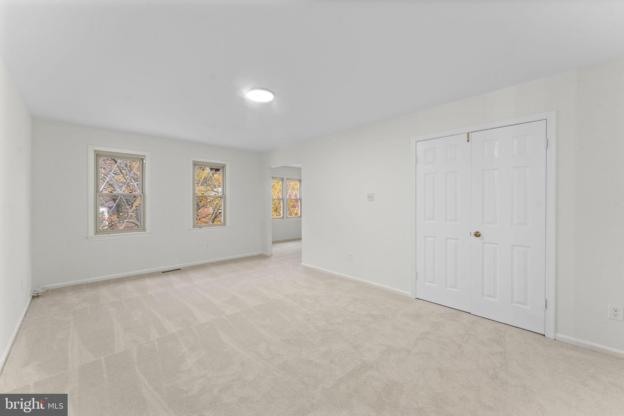 12574 Quincy Adams Court Herndon, VA 20171 - Photo 24 of 67 a view of an empty room with windows