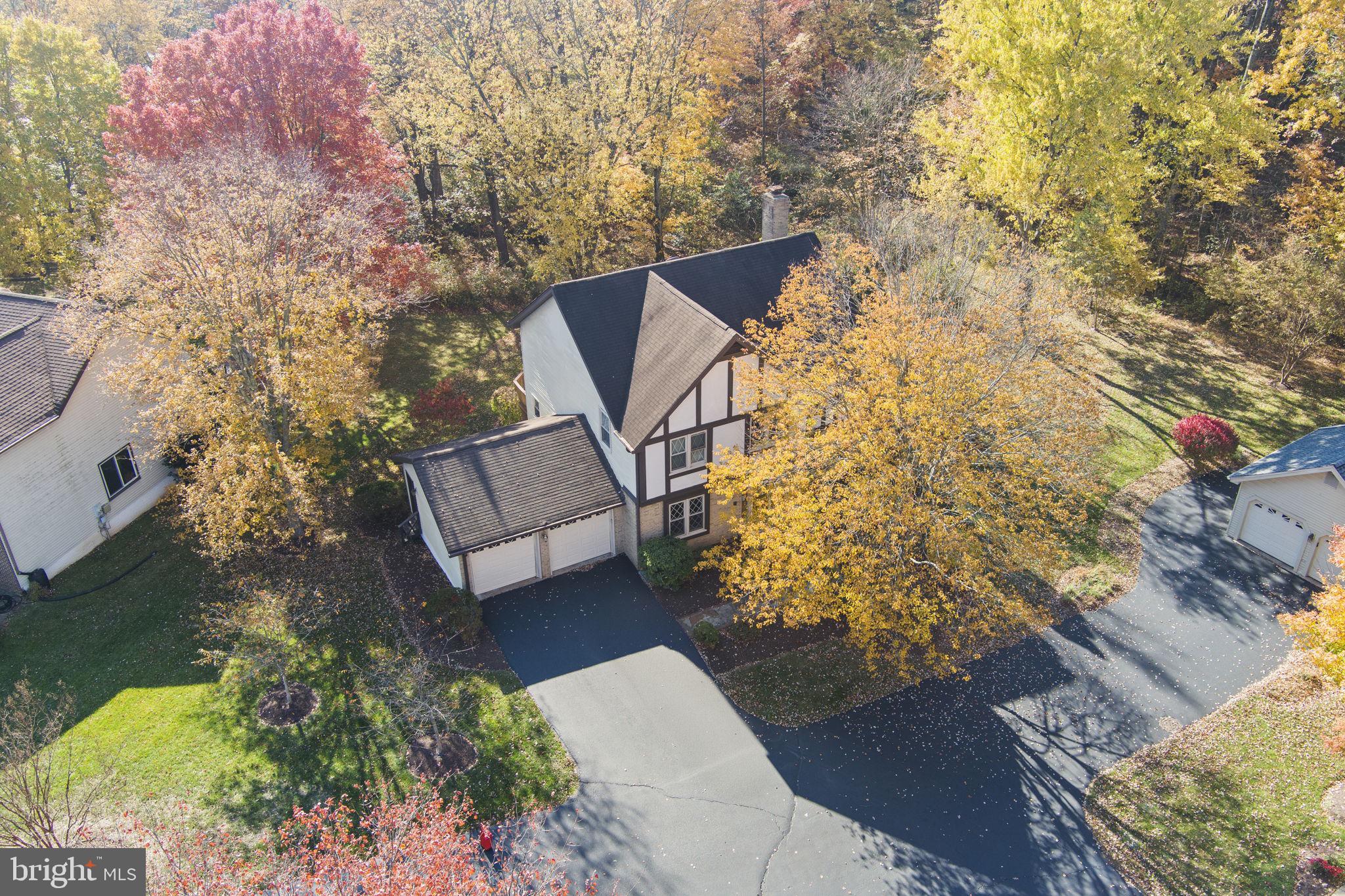 12574 Quincy Adams Court Herndon, VA 20171 - Photo 3 of 67 an aerial view of a house with a yard basket ball court and outdoor seating