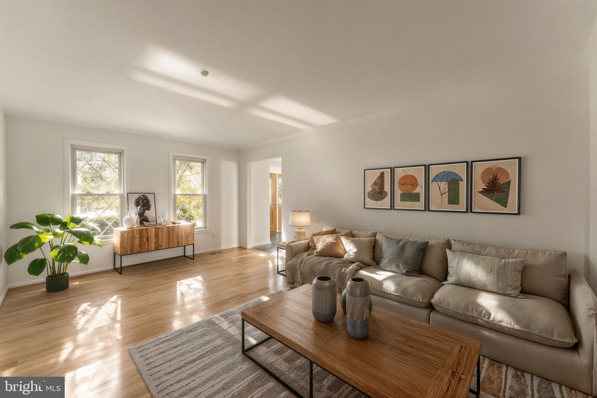 12574 Quincy Adams Court Herndon, VA 20171 - Photo 5 of 67 a living room with furniture and wooden floor