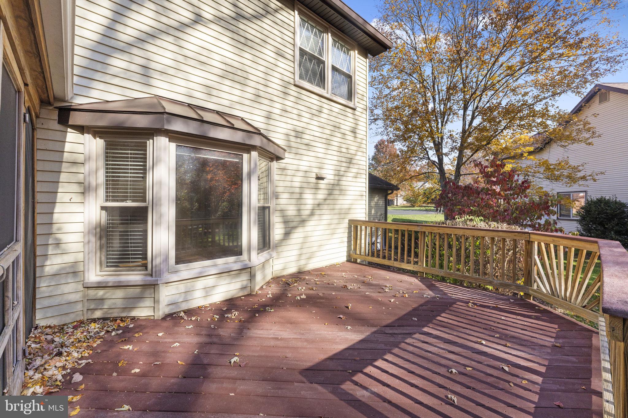 12574 Quincy Adams Court Herndon, VA 20171 - Photo 51 of 67 a view of a brick house with a large window
