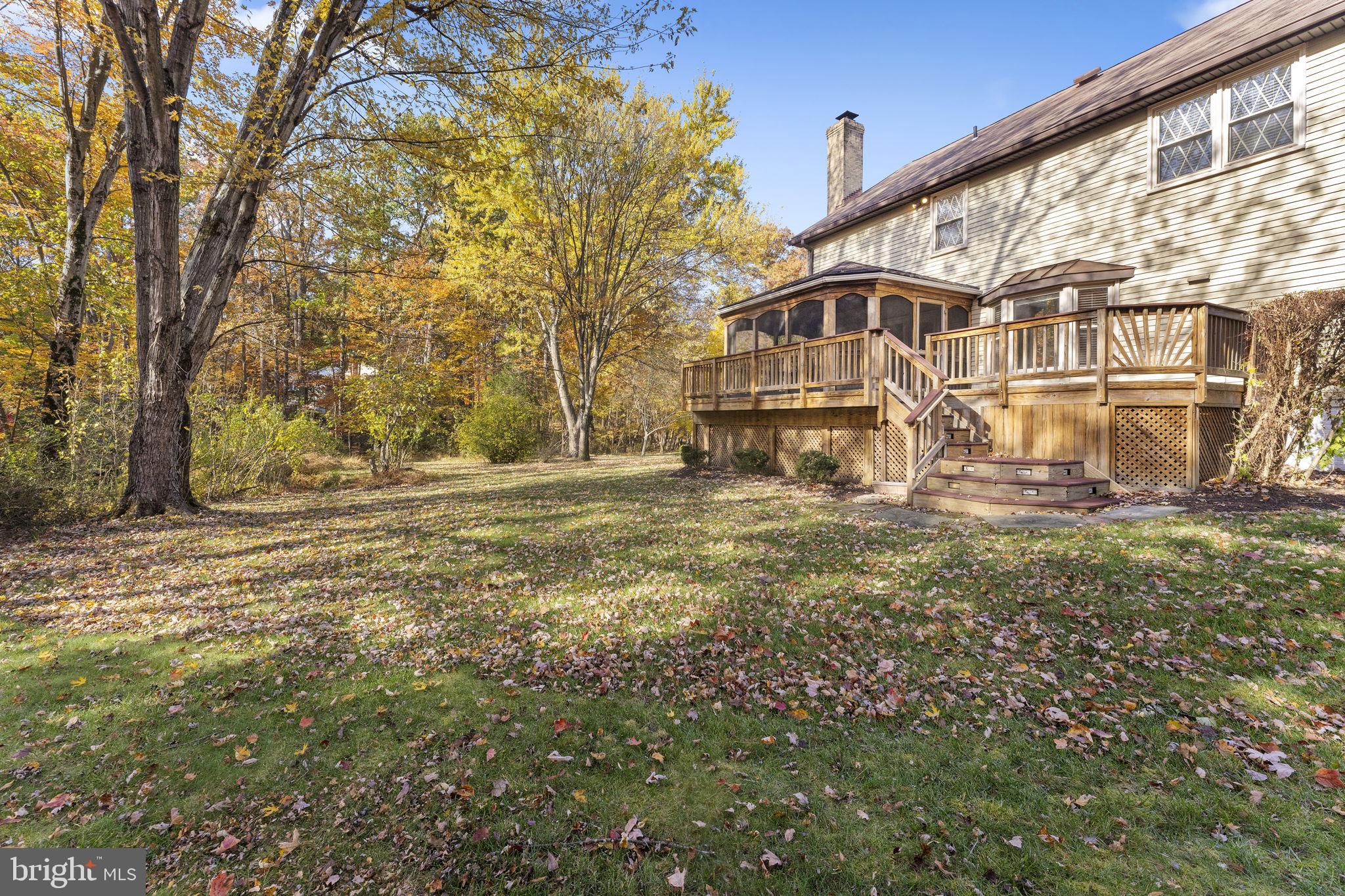 12574 Quincy Adams Court Herndon, VA 20171 - Photo 52 of 67 a view of a house with a yard