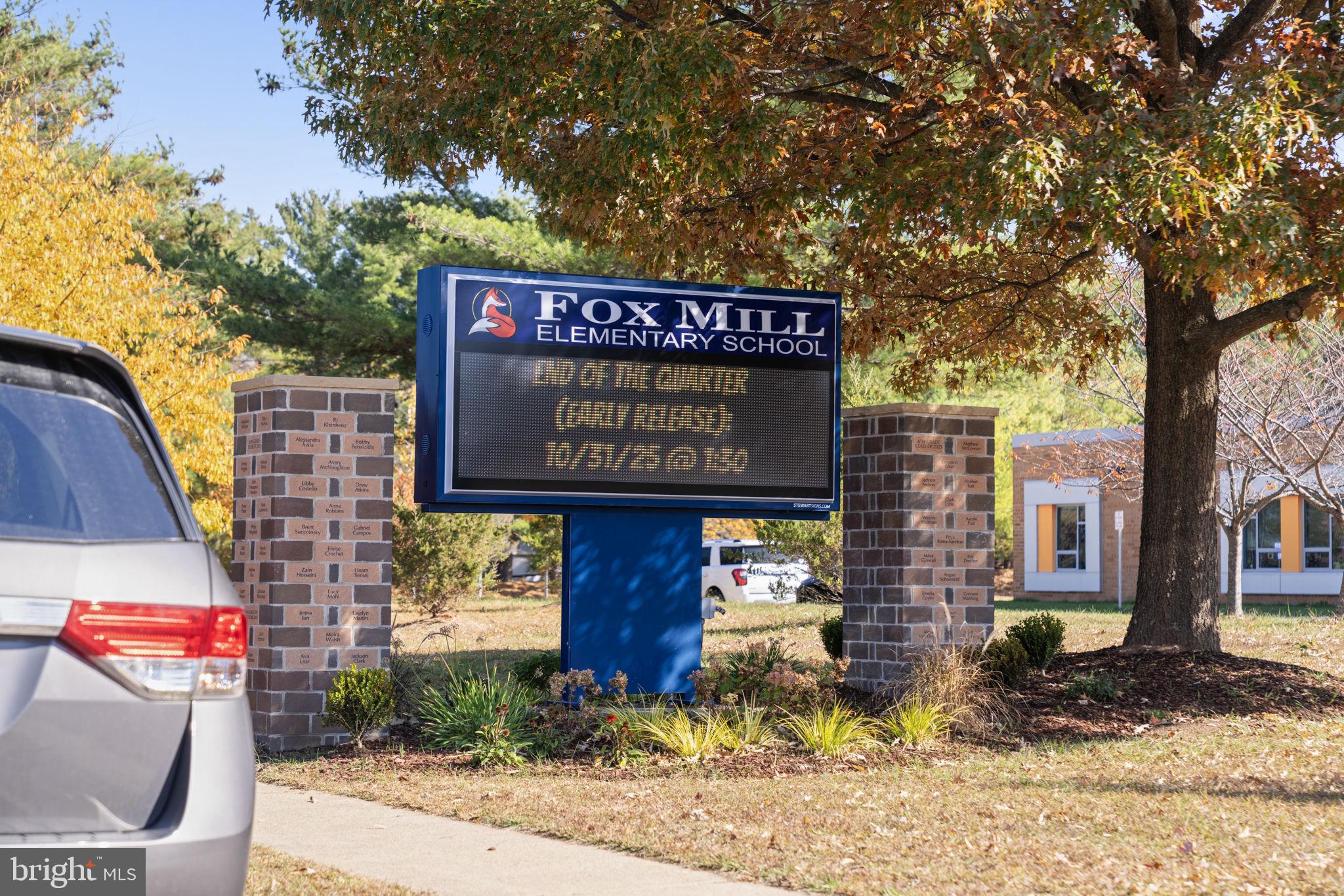 12574 Quincy Adams Court Herndon, VA 20171 - Photo 62 of 67 a sign on the side of a building