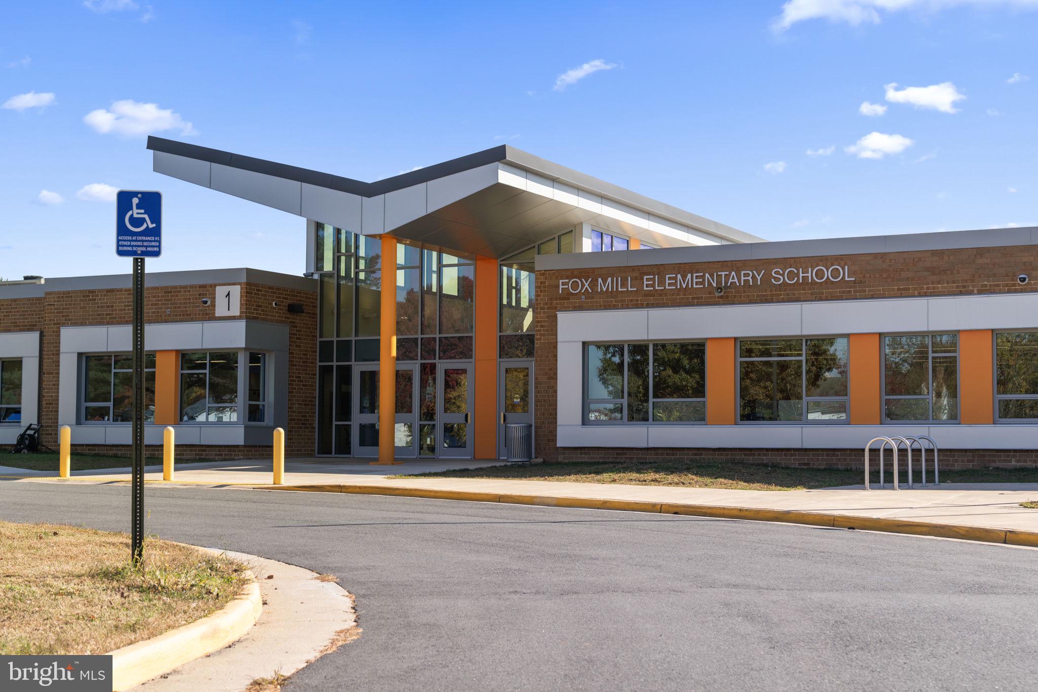 12574 Quincy Adams Court Herndon, VA 20171 - Photo 63 of 67 a view of a building with a entrance