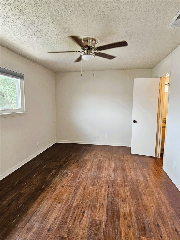 4816 Delwood Street, Unit 4 Corpus Christi, TX 78413 - Photo 13 of 22 wooden floor in an empty room