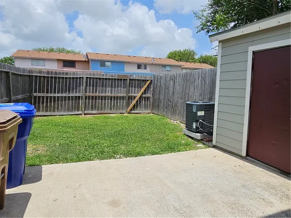 a view of a backyard with a garden