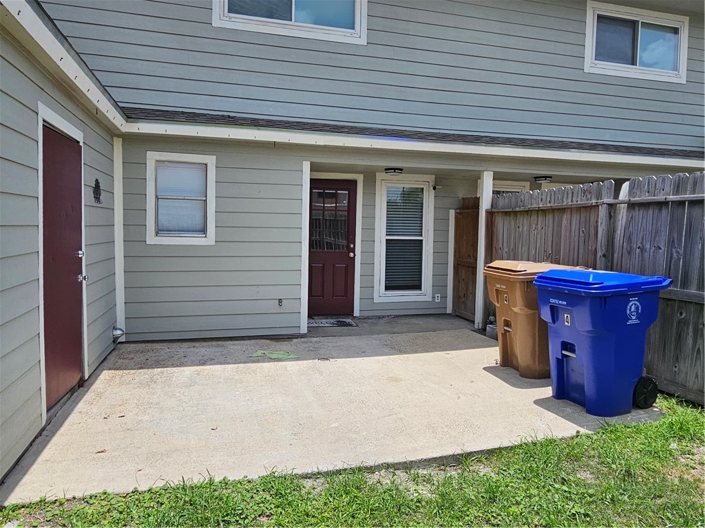 4816 Delwood Street, Unit 4 Corpus Christi, TX 78413 - Photo 22 of 22 a view of a house with a garage