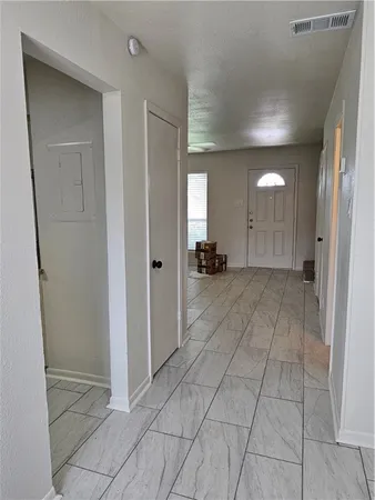 a view of a hallway with a elevator