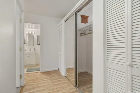 a view of a bathroom from a hallway