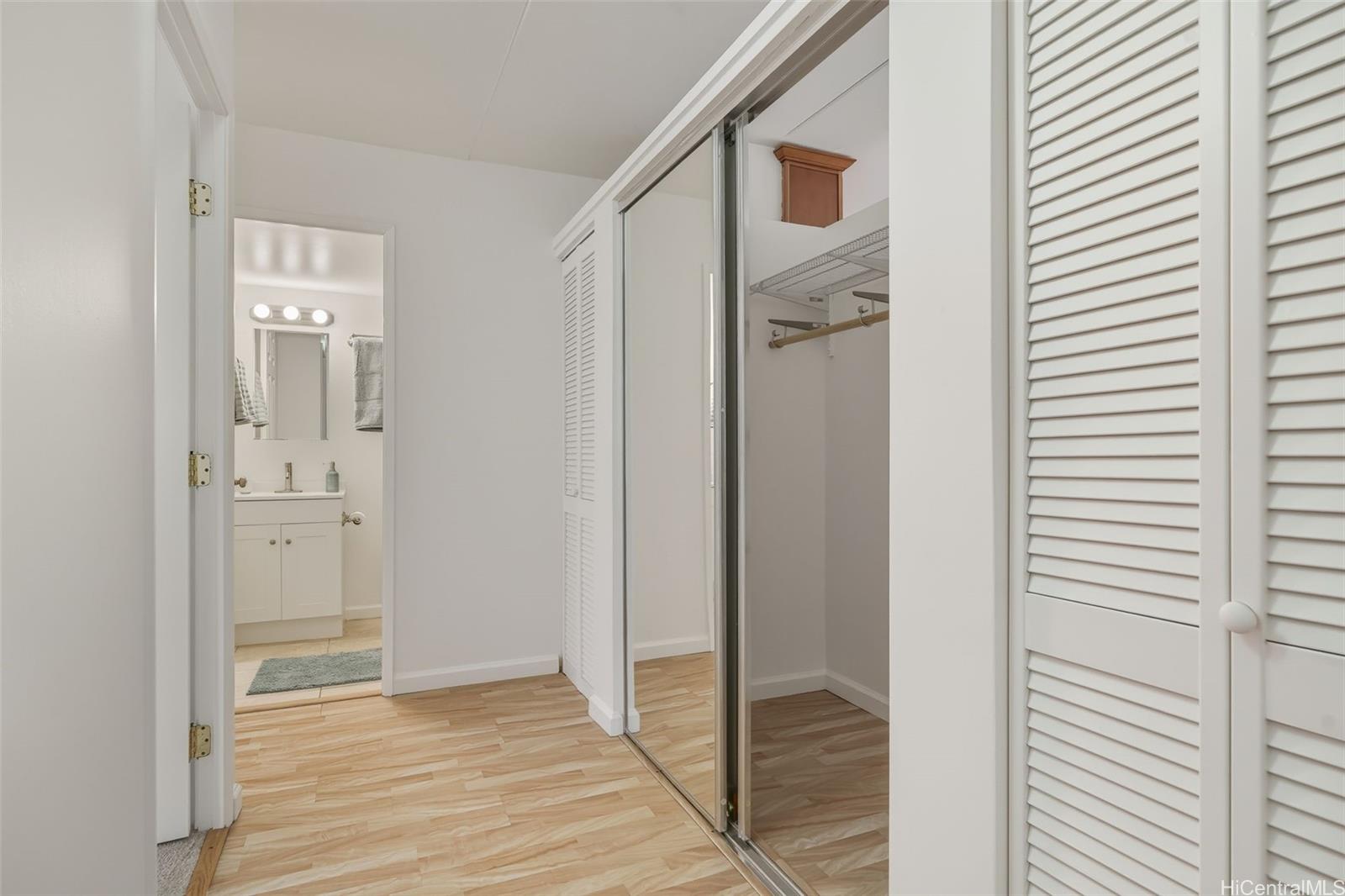 910 Ahana Street, Unit 308 Honolulu, HI 96814 - Photo 15 of 20 a view of a bathroom from a hallway